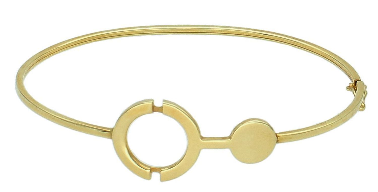 Bransoleta złota spłaszczone kółko pr 585, B OZ 1988 Złota bransoletka wykonana z 14 karatowego żółtego złota. Bransoletka to idealny pomysł na prezent. Złota bransoletka sztywna z modnym wzorem.1.jpg